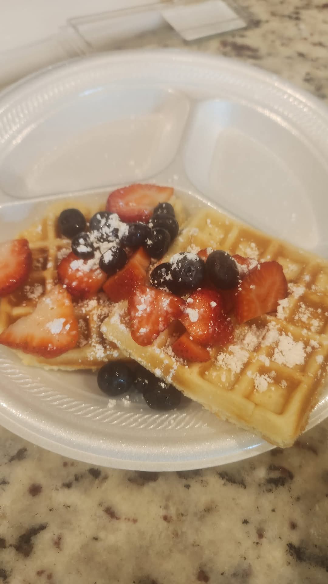 Waffles topped with berries