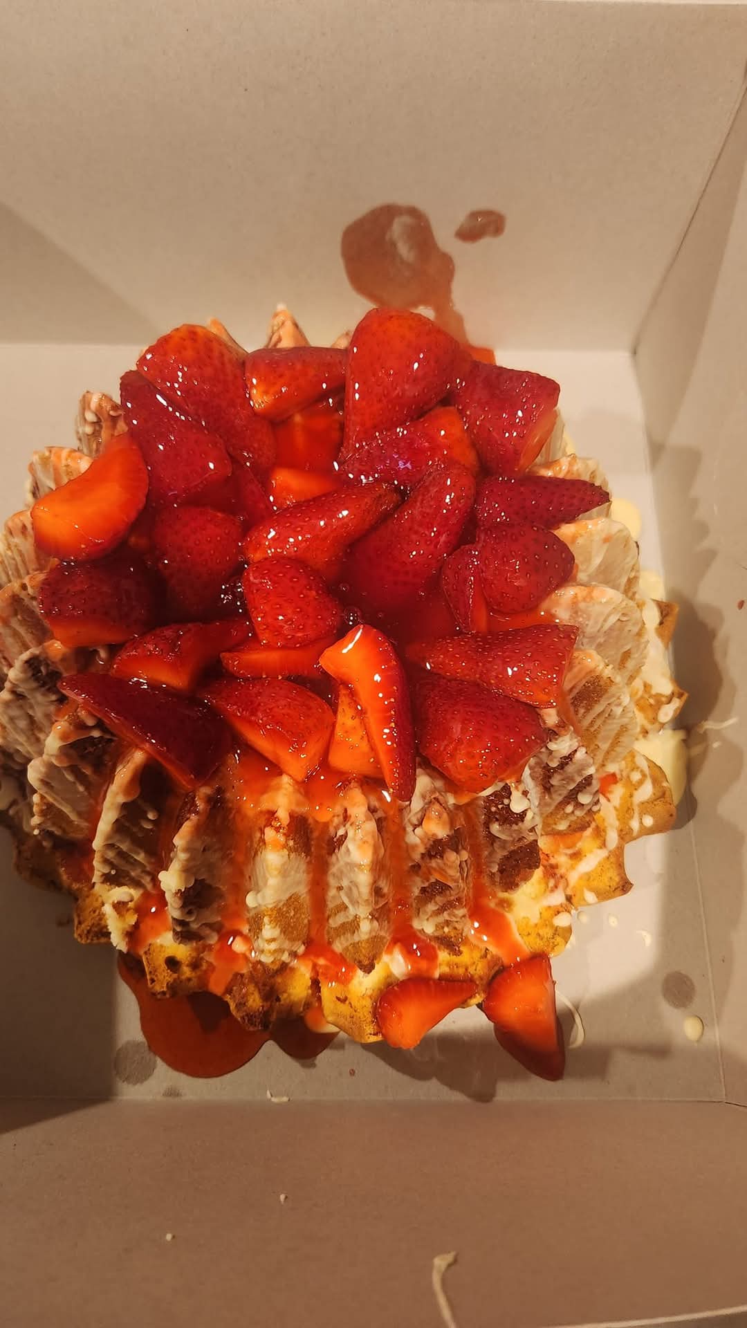Strawberry topped dessert in box
