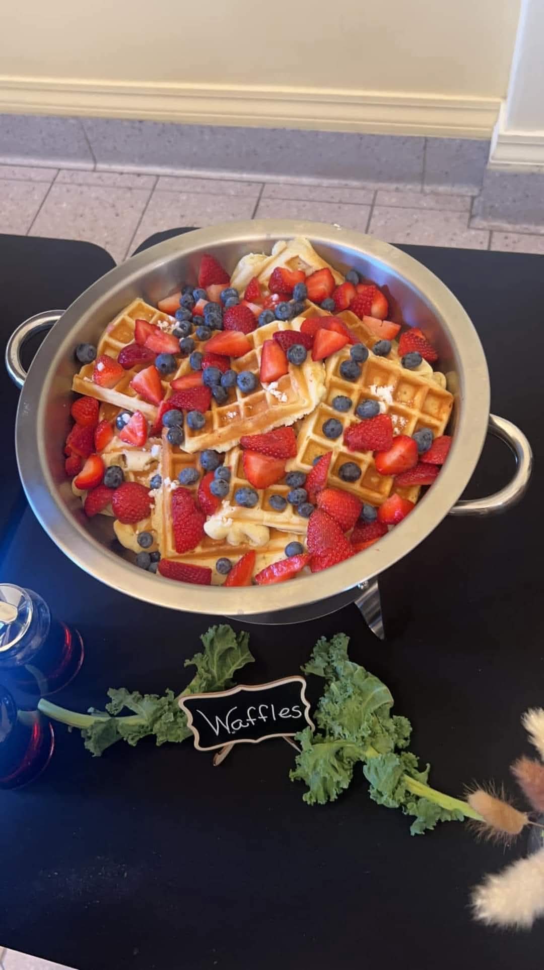Waffles topped with fresh berries
